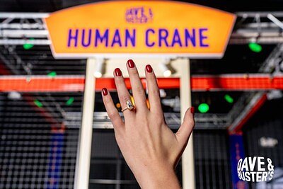 Dave & Buster's Bets on Love with $15,000 Human Crane Diamond Rings