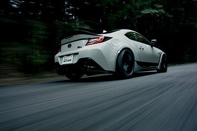 Bridging Speed and Sustainability for Racing Communities